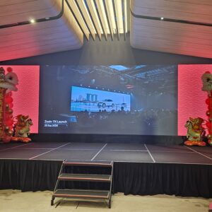 Balloon lion head Singapore CNY stage decor with God of Fortune at Zeekr launch