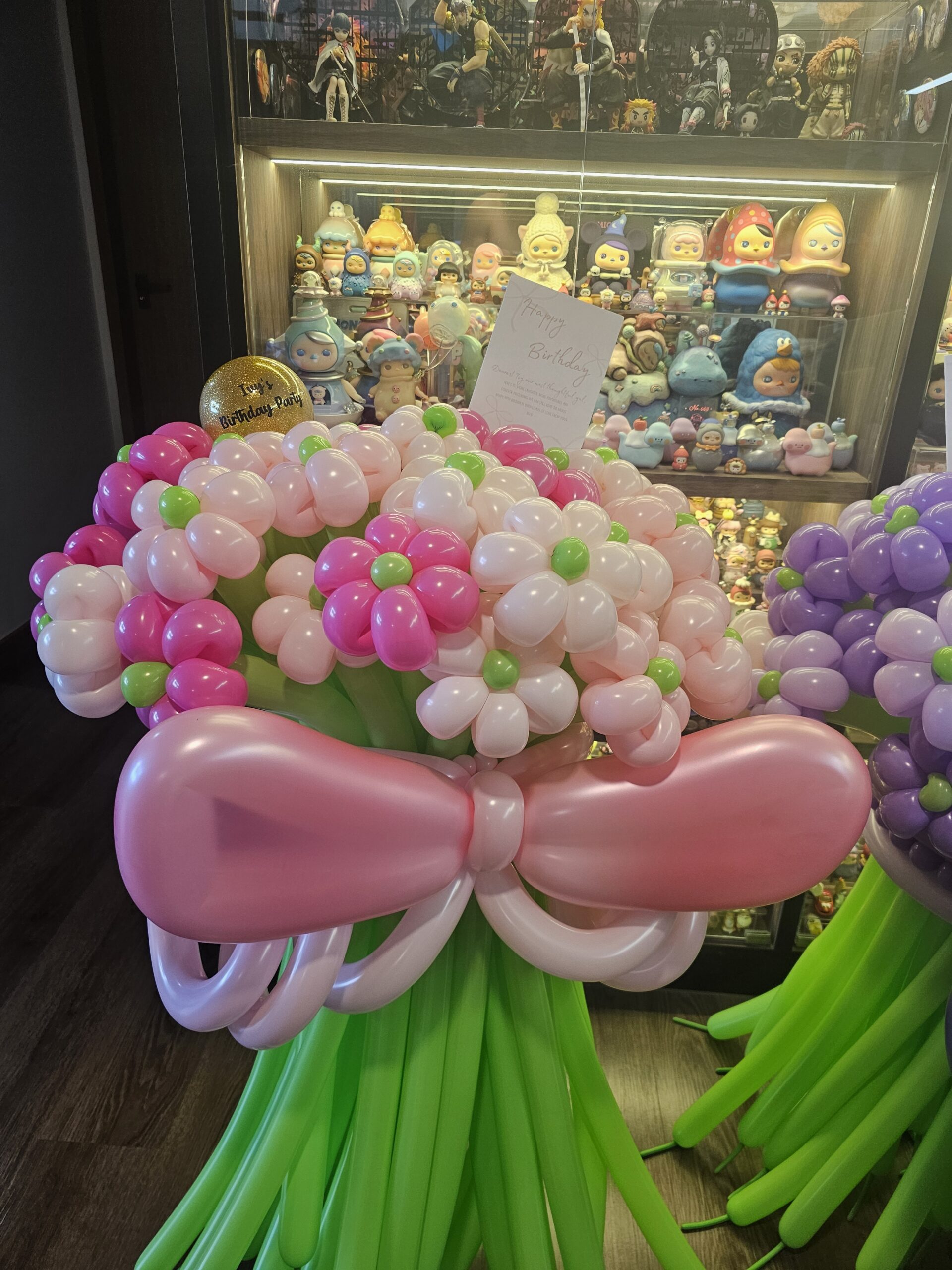 Pink daisy balloon flower bouquet Singapore with handwritten birthday card